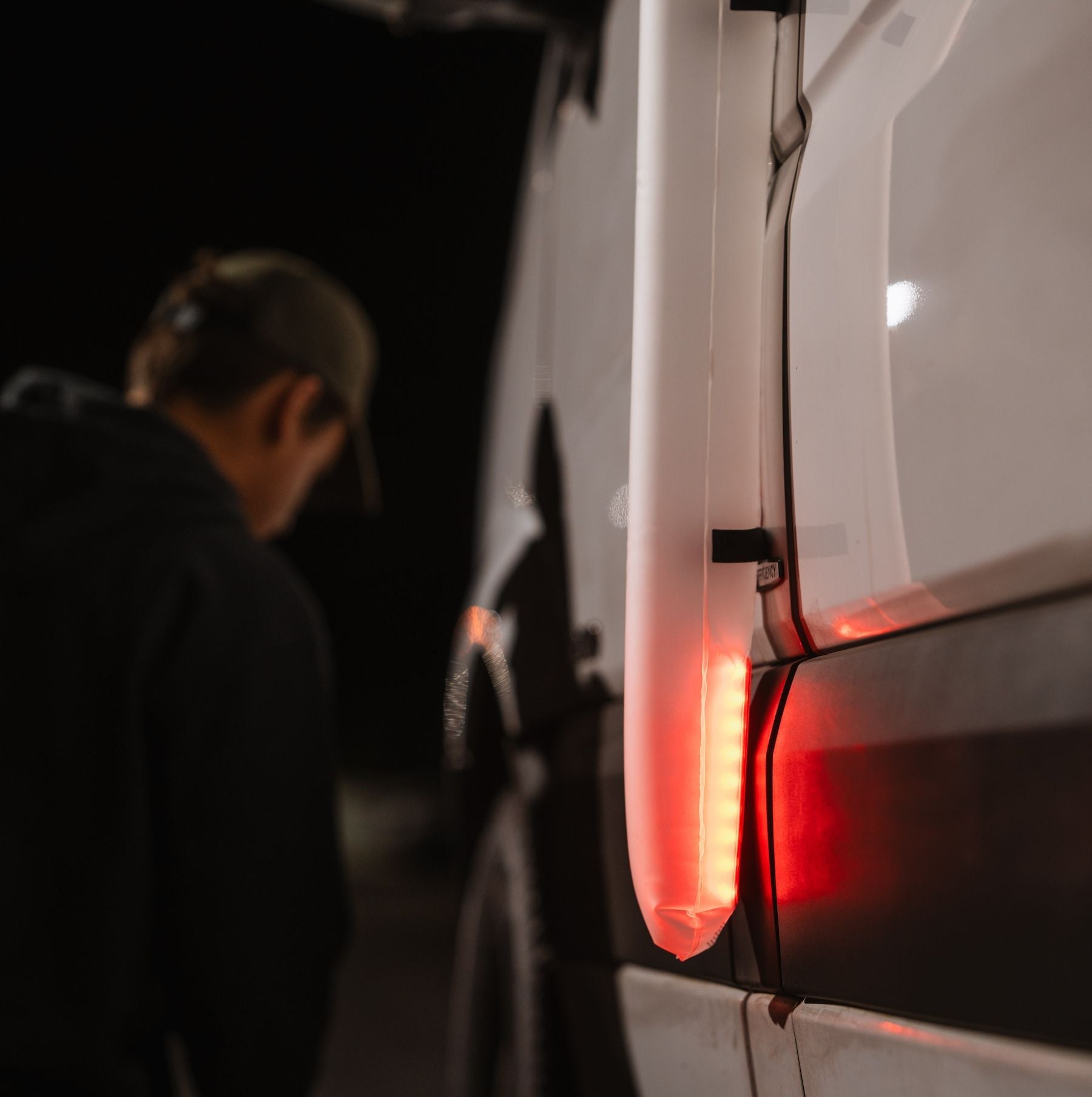 Solar Beam red mode on the side of a van