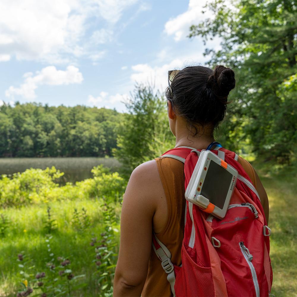 Easily inflates and deflates and can be attached to a backpack.